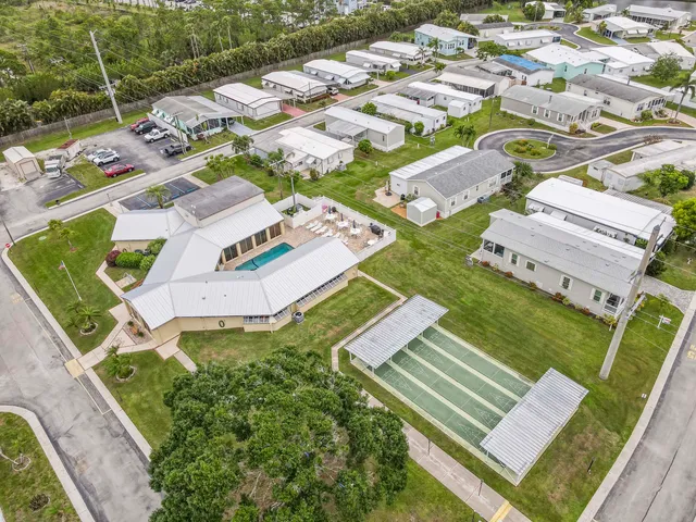 an aerial view of a house with a garden