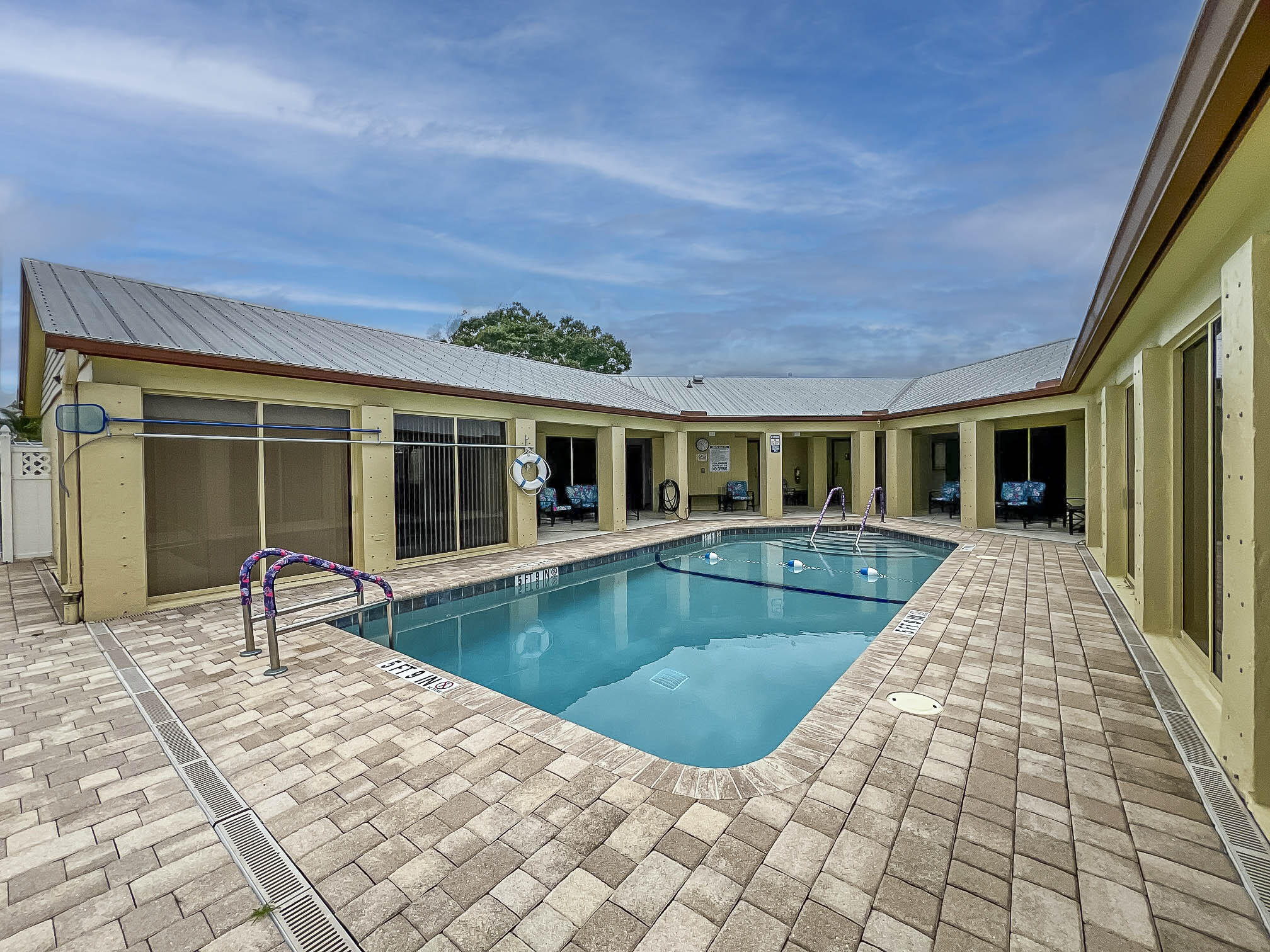 4800 Southeast Federal Highway, Unit 17 Stuart, FL 34997 - Photo 26 of 29 a view of a house with swimming pool in front of it