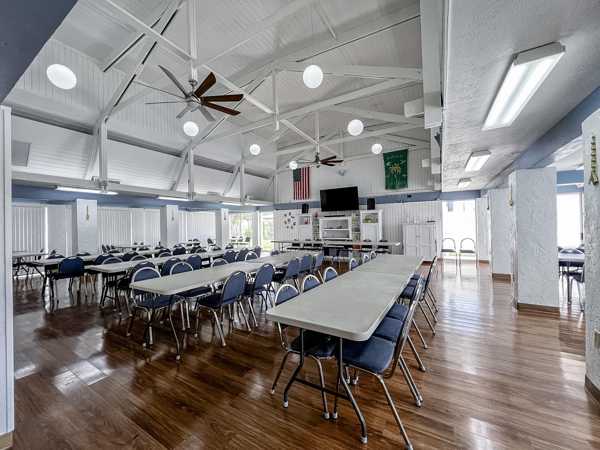 4800 Southeast Federal Highway, Unit 17 Stuart, FL 34997 - Photo 28 of 29 a view of a dining area with furniture window and wooden floor