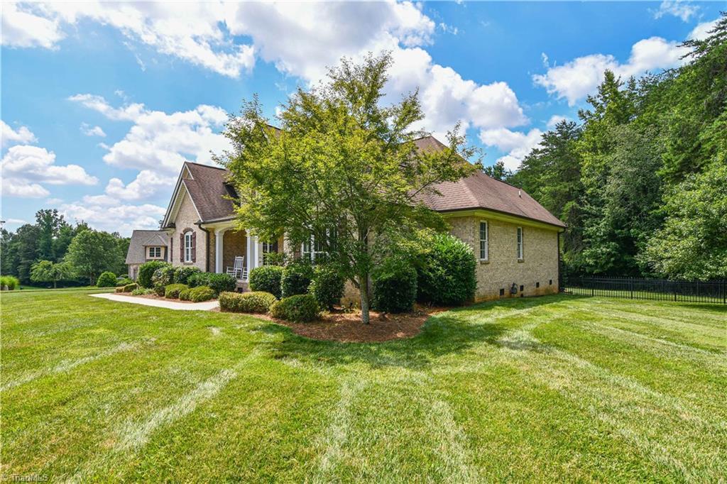 5221 Harley Stafford Drive Oak Ridge, NC 27310 - Photo 3 of 29 Gallery Image 3
