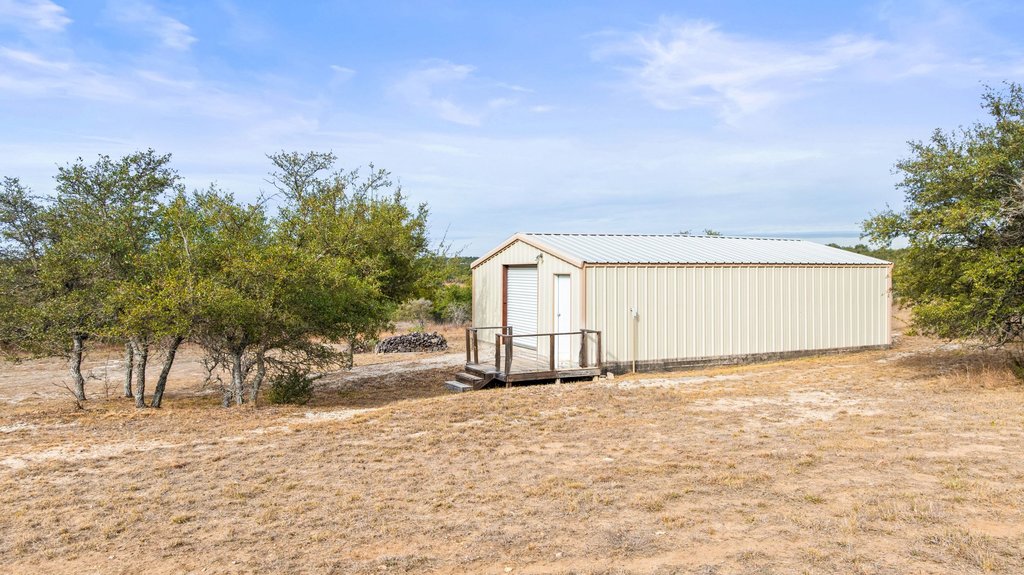 232 Crooked Oak Round Mountain, TX 78663 - Photo 32 of 40 View of outbuilding
