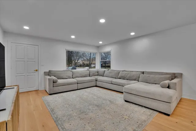 a living room with furniture and a couch