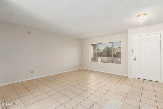 a view of an empty room with window