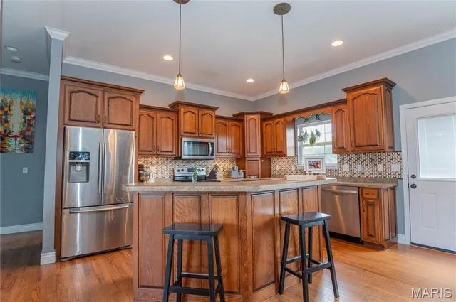 $390,000 | 425 Edwards Drive, Holts Summit, MO 65043