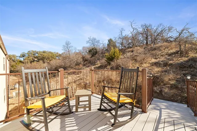 a view of a chairs and table on the terrace