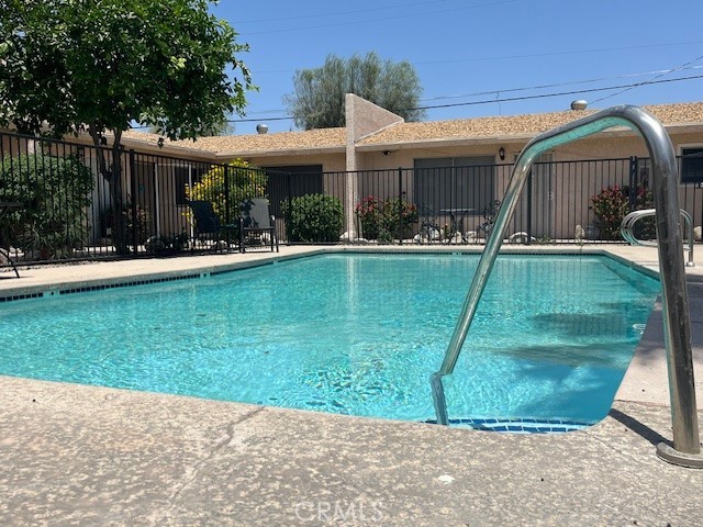 73740 Santa Rosa Way, Unit 5 Palm Desert, CA 92260 - Photo 4 of 20 a view of a house with backyard and sitting area