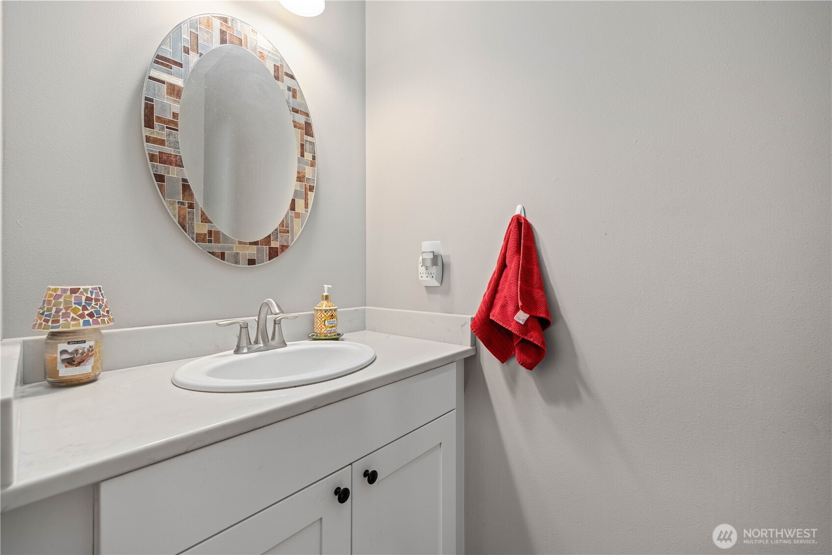 48 Golf Course Drive Pateros, WA 98846 - Photo 20 of 37 a bathroom with a sink and a mirror