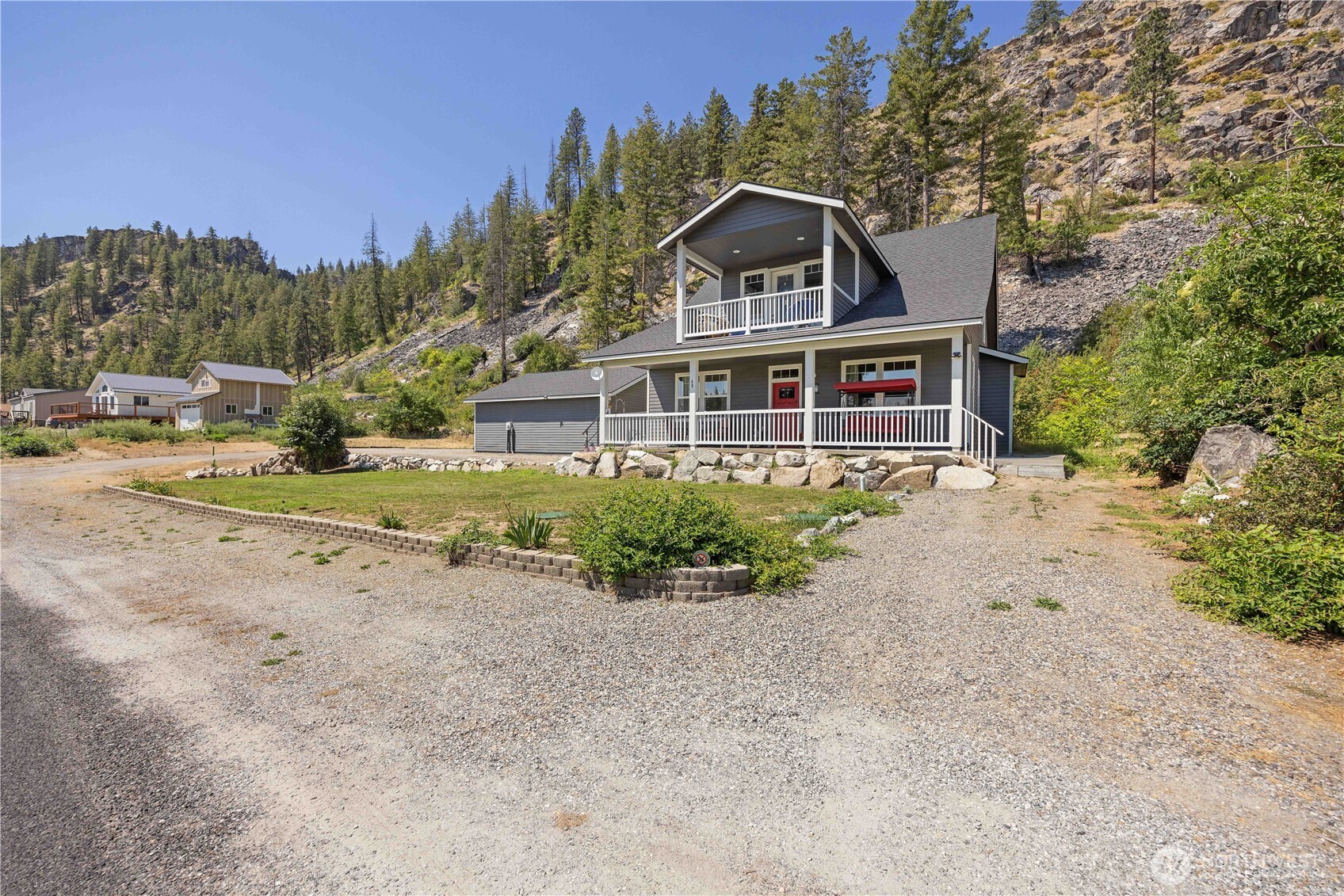 48 Golf Course Drive Pateros, WA 98846 - Photo 2 of 37 front view of a house with a yard