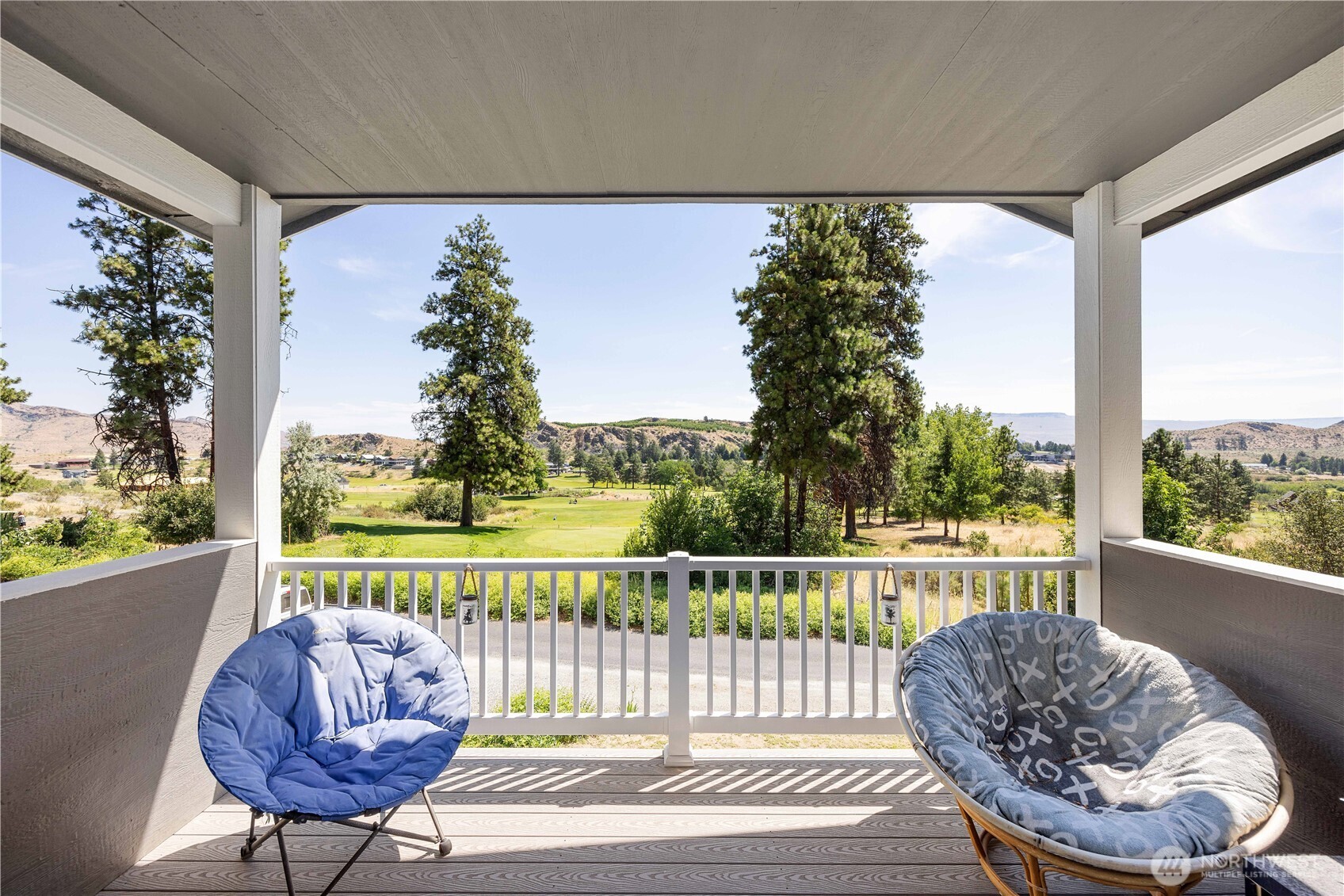 48 Golf Course Drive Pateros, WA 98846 - Photo 24 of 37 a view of a chair and table in the balcony
