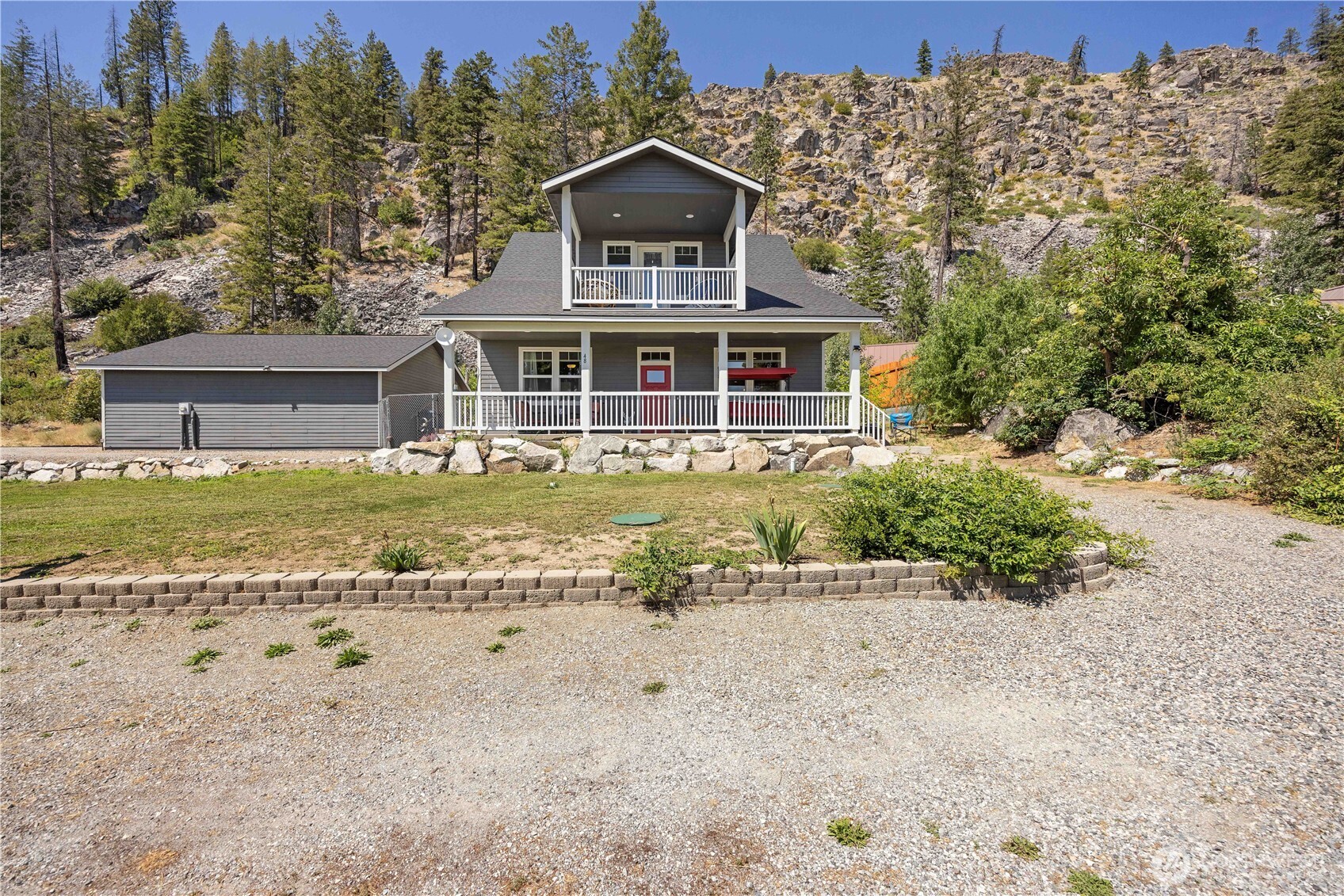 48 Golf Course Drive Pateros, WA 98846 - Photo 32 of 37 a front view of a house with a yard