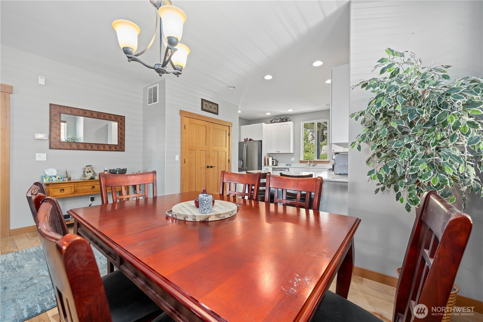 48 Golf Course Drive Pateros, WA 98846 - Photo 8 of 37 a view of a dining room with furniture and chandelier