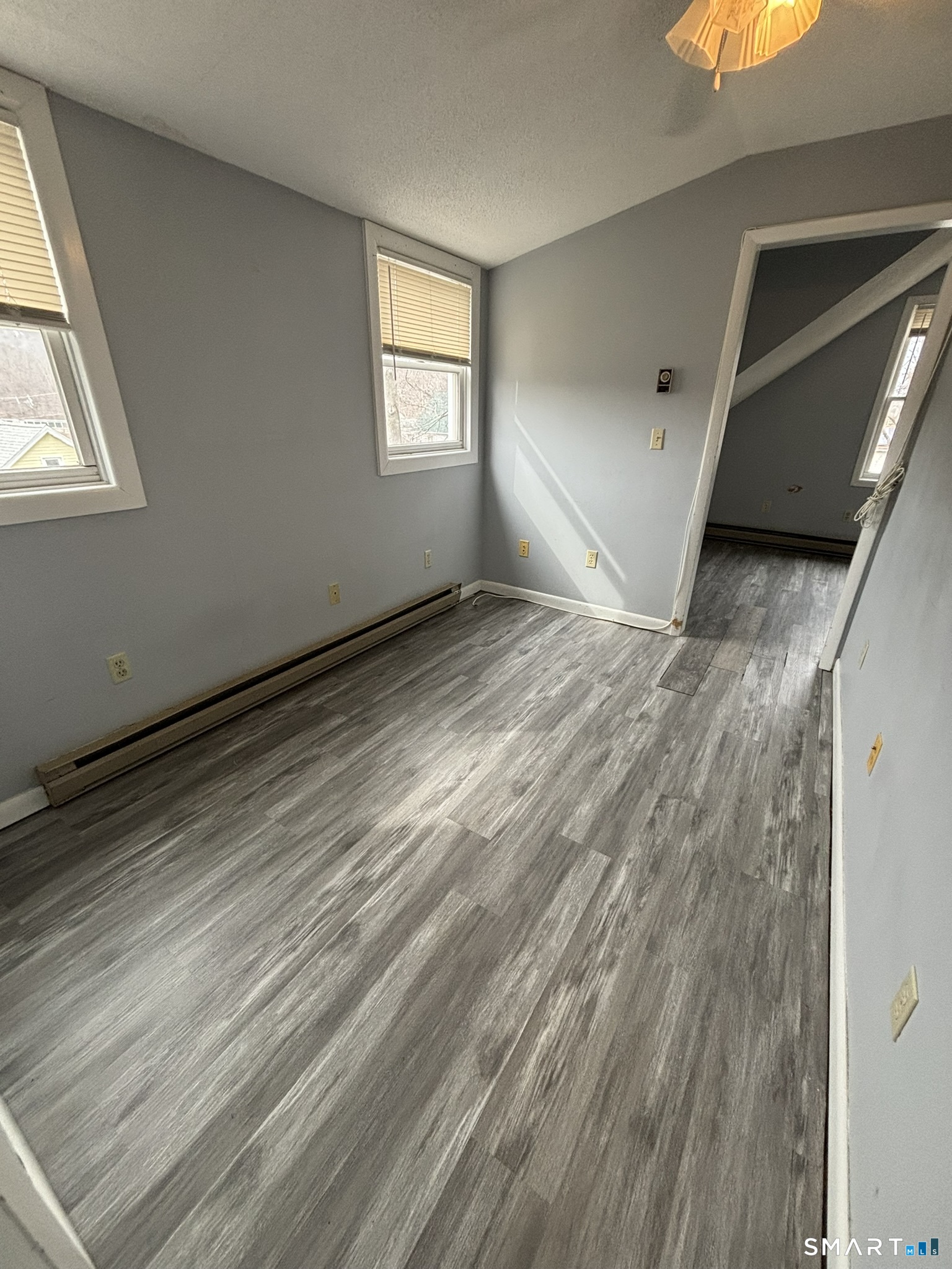 11 Roberts Street, Unit 3 Bristol, CT 06010 - Photo 6 of 11 a view of room and window