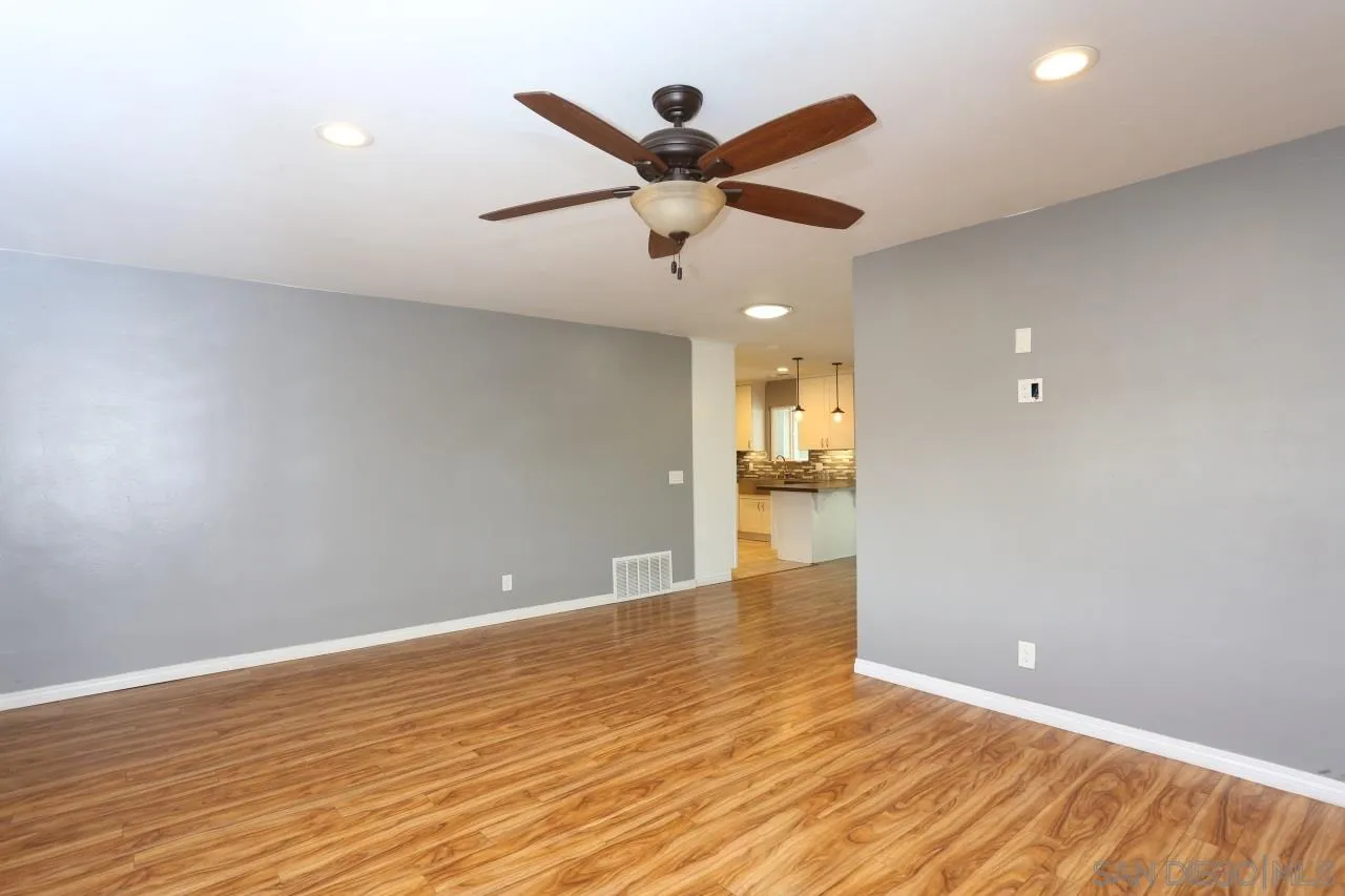 1229 Rees Road Escondido, CA 92026 - Photo 14 of 44 a view of an empty room and kitchen view