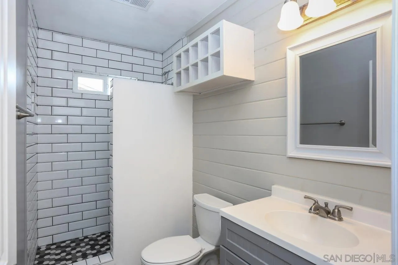 1229 Rees Road Escondido, CA 92026 - Photo 7 of 44 a bathroom with a sink toilet and shower