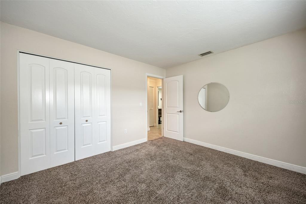1330 Georgetowne Circle Sarasota, FL 34232 - Photo 35 of 46 a view of an empty room and window