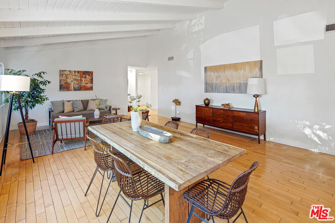 1102 Maple Street Santa Monica, CA 90405 - Photo 14 of 51 a dining room with furniture and wooden floor
