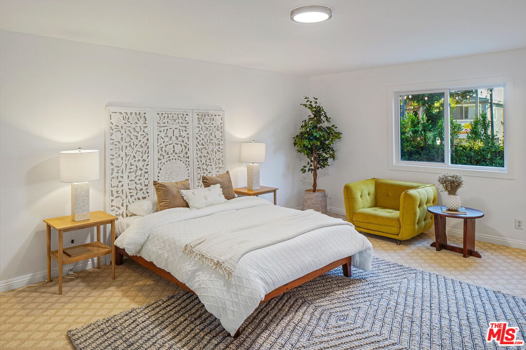 1102 Maple Street Santa Monica, CA 90405 - Photo 26 of 51 a bedroom with a bed and a couch