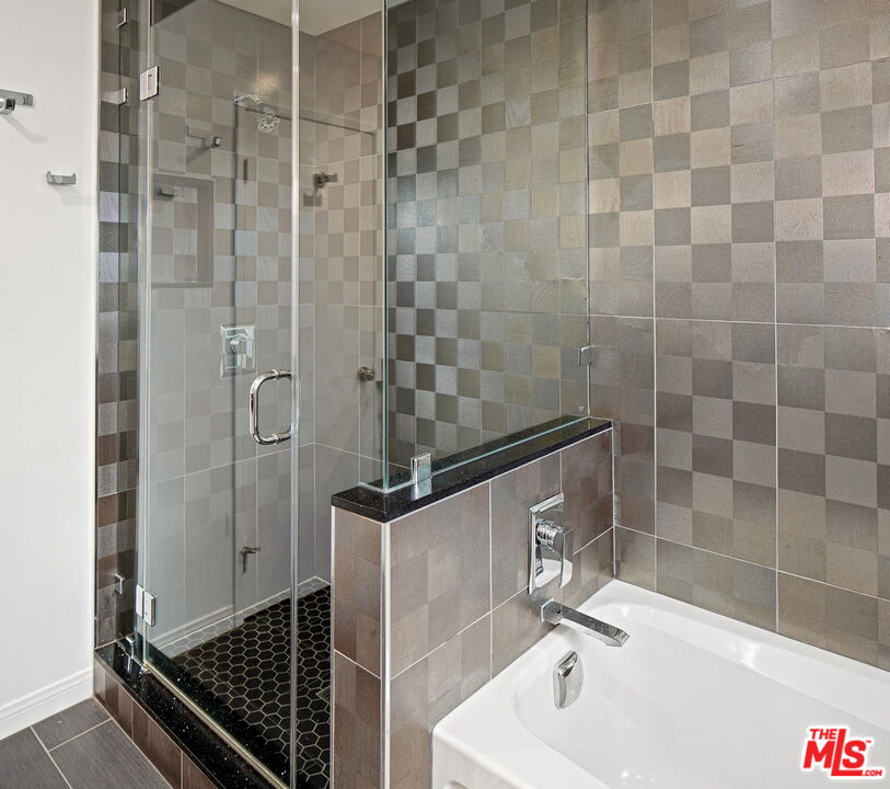 1102 Maple Street Santa Monica, CA 90405 - Photo 31 of 51 a bathroom with a sink and shower