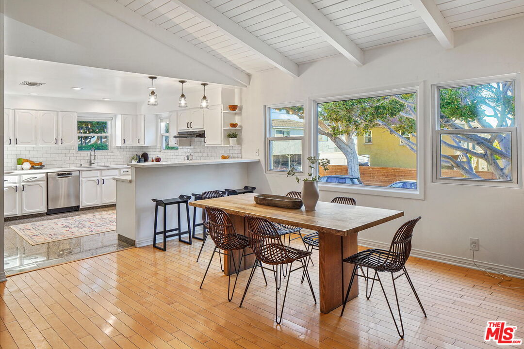1102 Maple Street Santa Monica, CA 90405 - Photo 9 of 51 a view of a dining room with furniture window and wooden floor