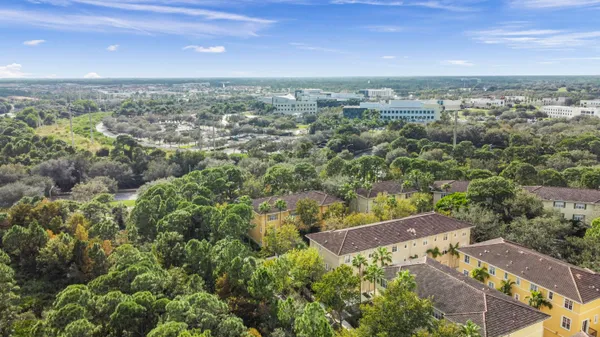 an aerial view of a city with lots of residential buildings