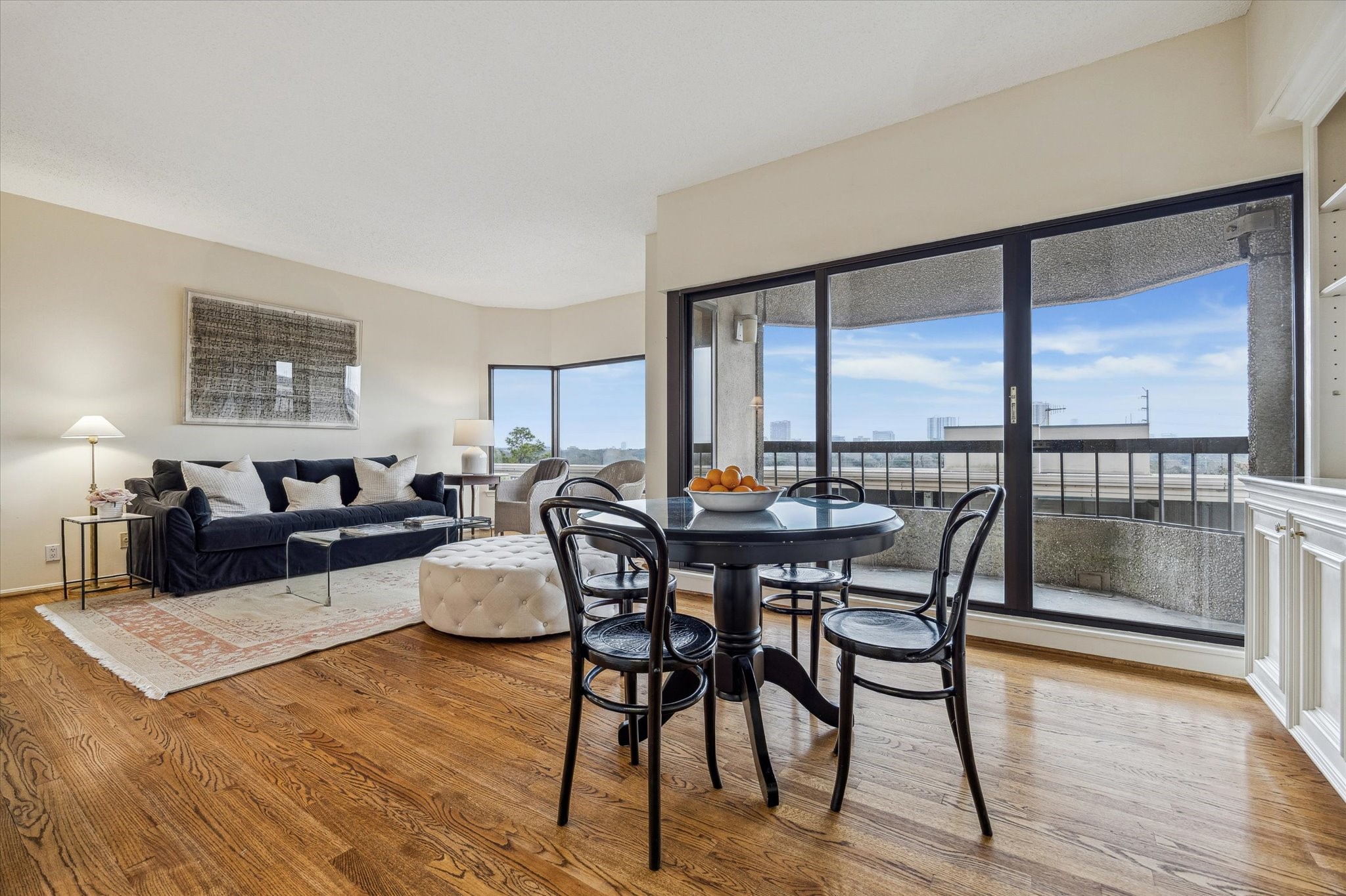 2001 Holcombe Boulevard, Unit 504 Houston, TX 77030 - Photo 5 of 38 Living and dining with beautiful hardwood floors.