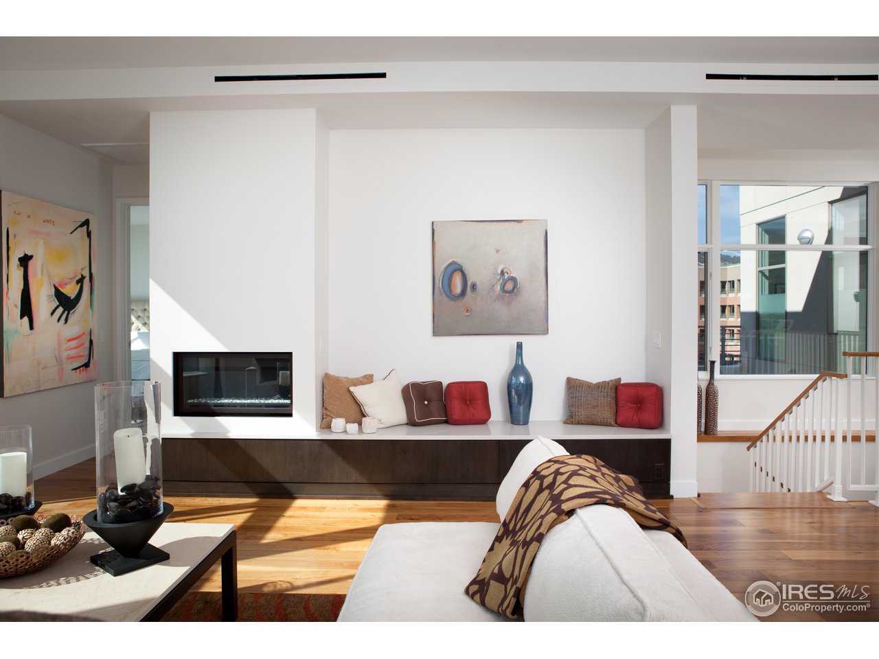 1655 Walnut Street, Unit 305 Boulder, CO 80302 - Photo 11 of 25 a living room with furniture and a flat screen tv