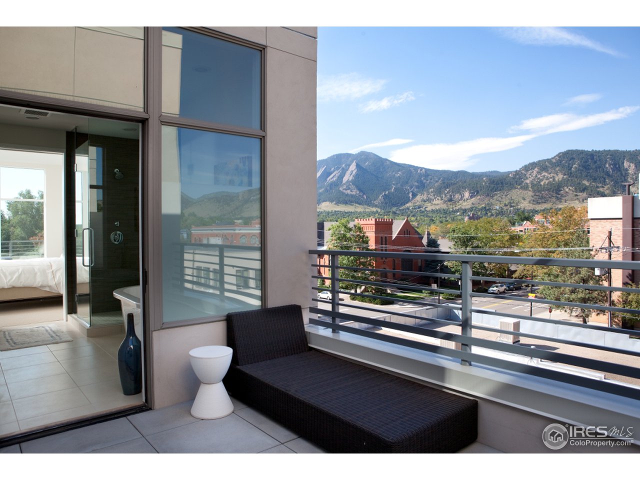 1655 Walnut Street, Unit 305 Boulder, CO 80302 - Photo 12 of 25 a view of a balcony and chairs