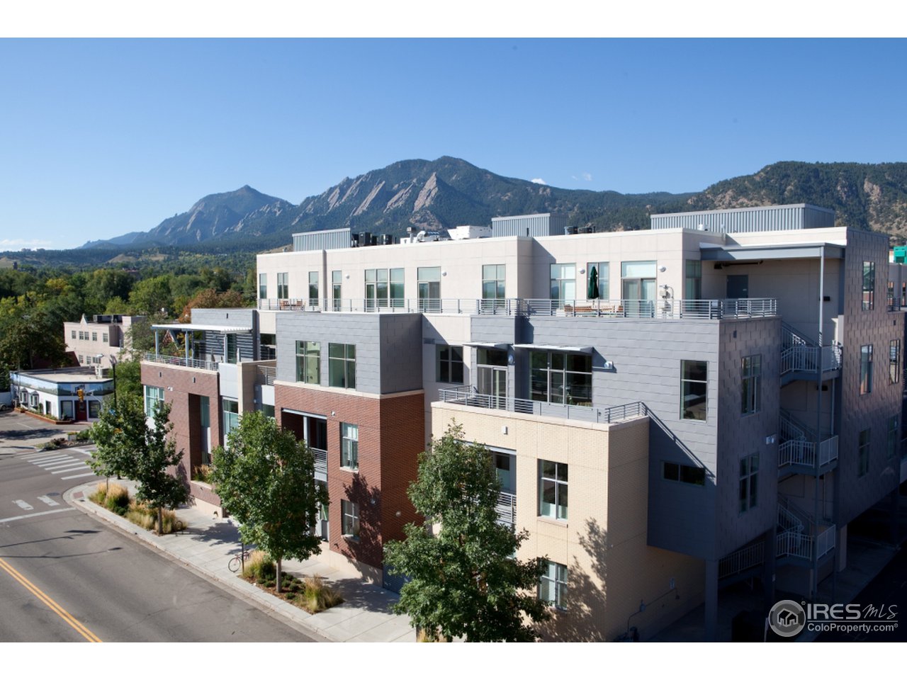 1655 Walnut Street, Unit 305 Boulder, CO 80302 - Photo 22 of 25 a view of a city with a building in the background