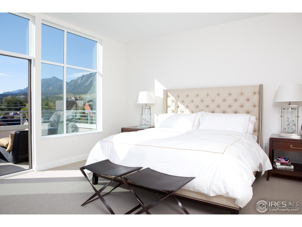 1655 Walnut Street, Unit 305 Boulder, CO 80302 - Photo 8 of 25 a bedroom with a bed and window