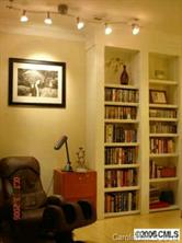 1123 Market Street, Unit 1123 Fort Mill, SC 29708 - Photo 2 of 6 a living room with furniture a walk in closet and a window