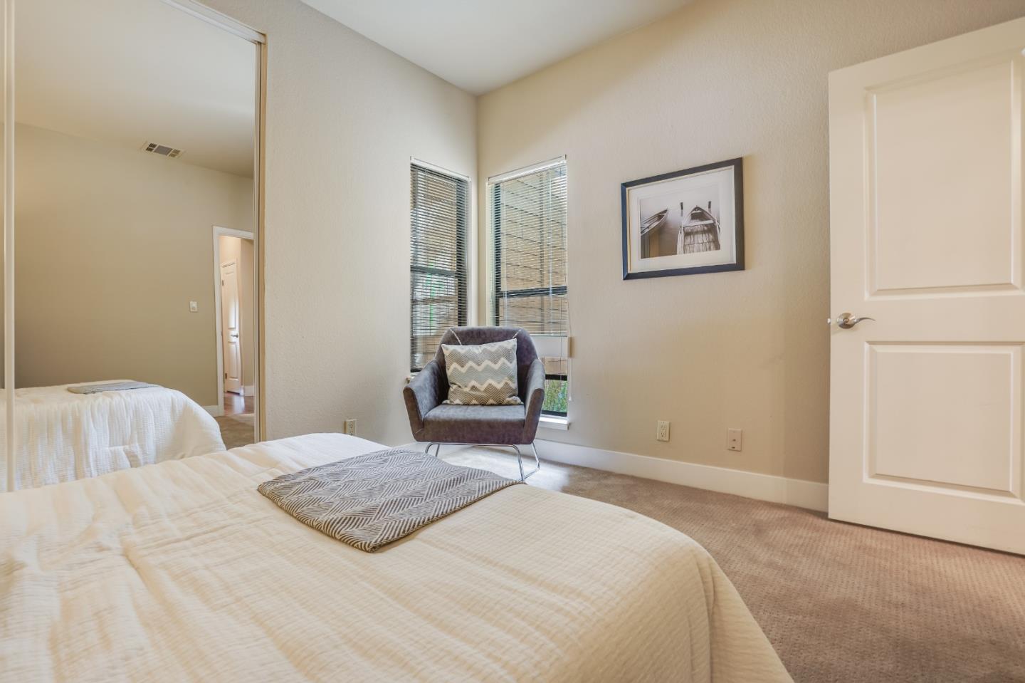 174 Copper Ridge Road San Ramon, CA 94582 - Photo 16 of 29 a bedroom with a bed and painting on the wall