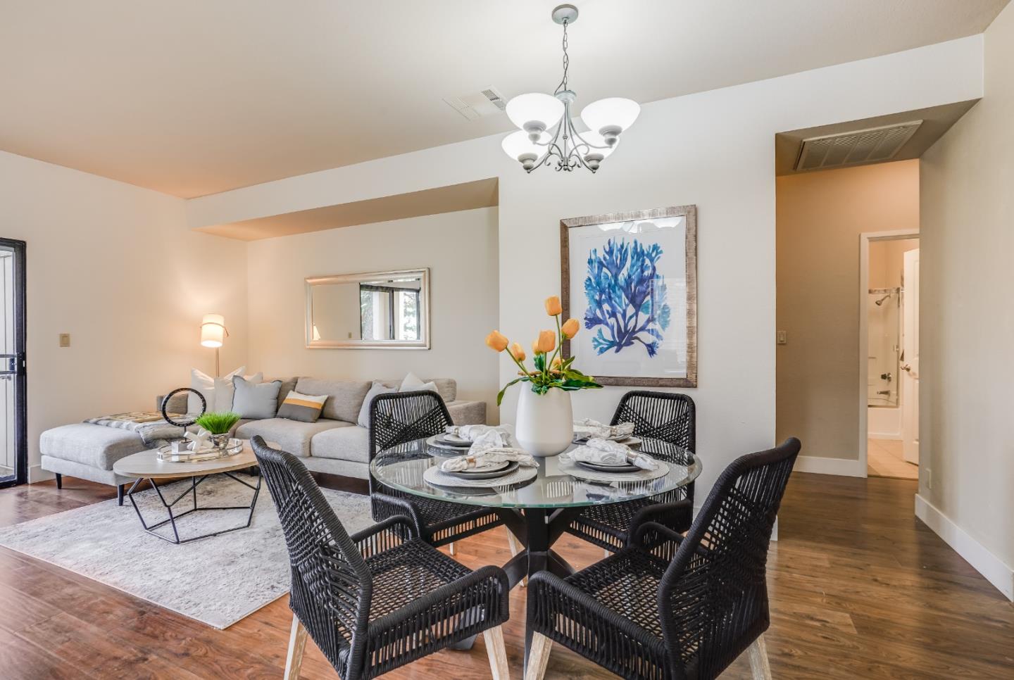 174 Copper Ridge Road San Ramon, CA 94582 - Photo 2 of 29 a view of a dining room with furniture wooden floor and chandelier