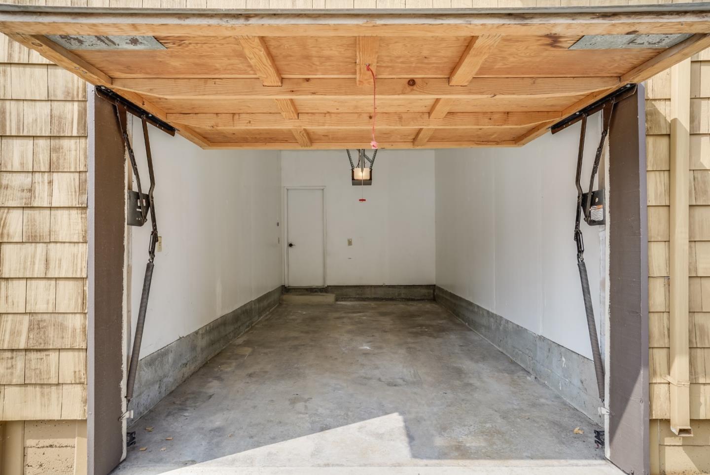 174 Copper Ridge Road San Ramon, CA 94582 - Photo 24 of 29 a view of a room with racks on the wall