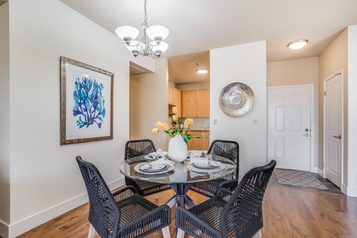 174 Copper Ridge Road San Ramon, CA 94582 - Photo 3 of 29 a view of a dining room with furniture and wooden floor