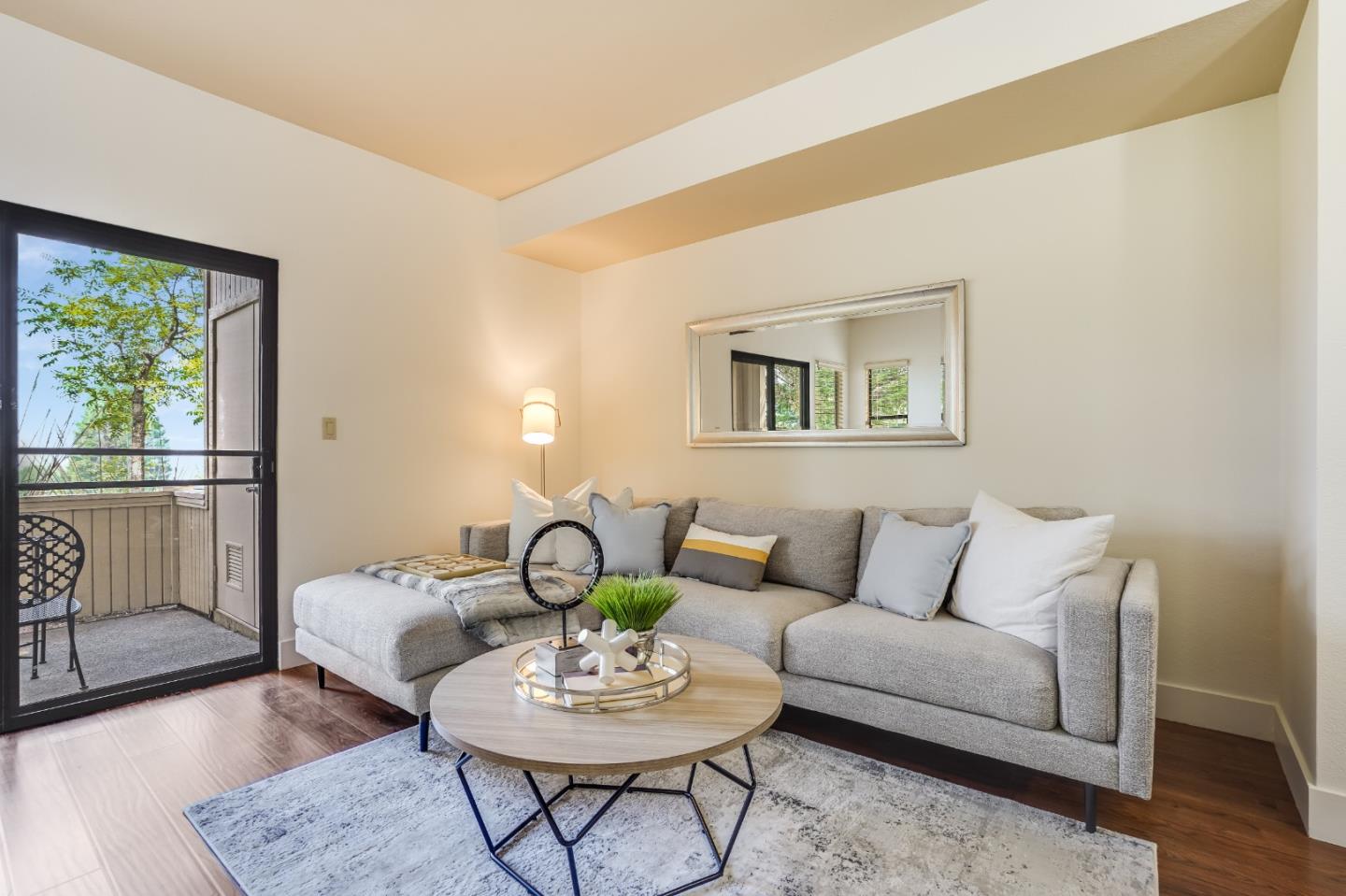 174 Copper Ridge Road San Ramon, CA 94582 - Photo 4 of 29 a living room with furniture and a wooden floor