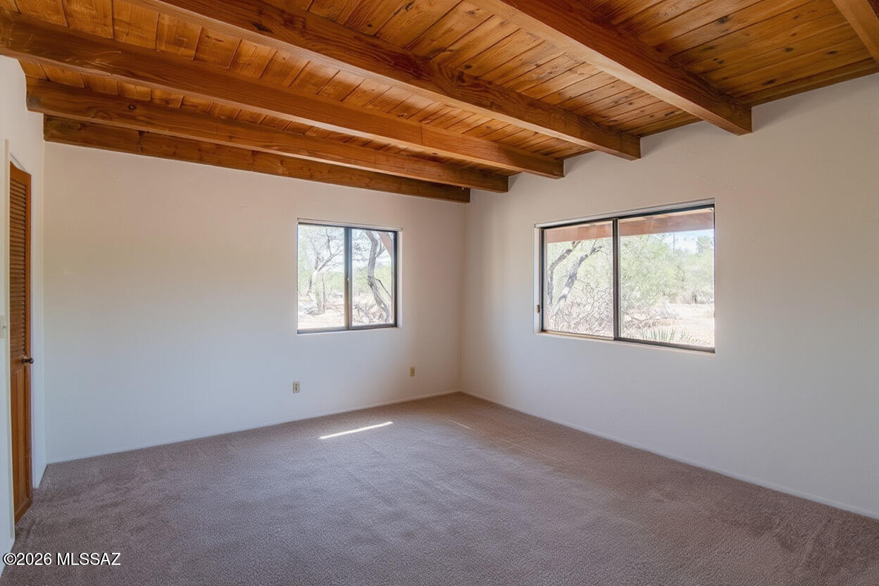 4130 East River Road Tucson, AZ 85718 - Photo 39 of 46 a view of an empty room with windows