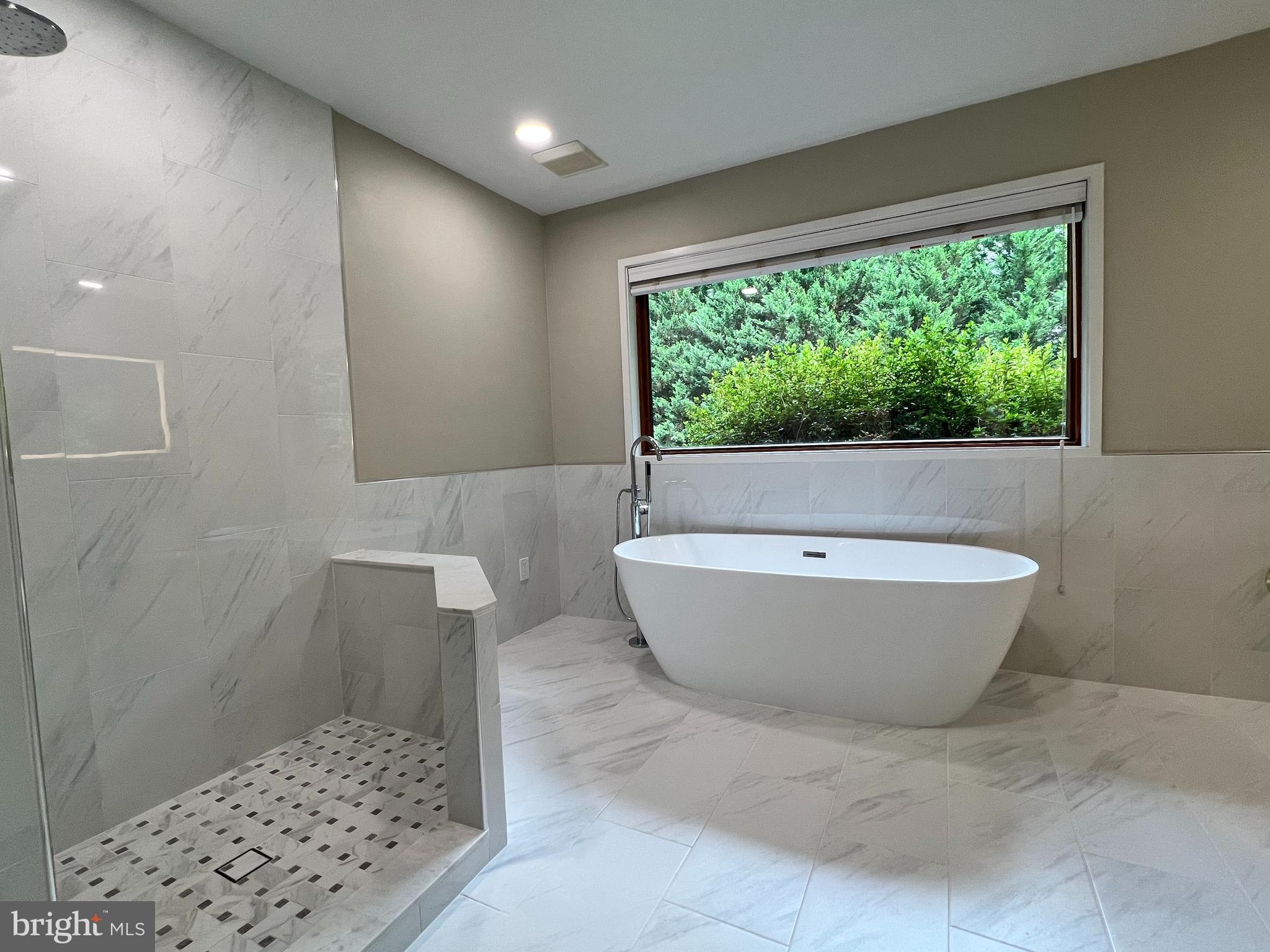 6710 Persimmon Tree Road Bethesda, MD 20817 - Photo 17 of 39 a view of bathroom with bathtub and shower
