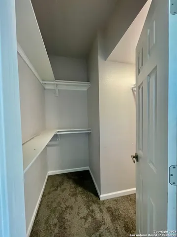 a view of a livingroom with wooden floor