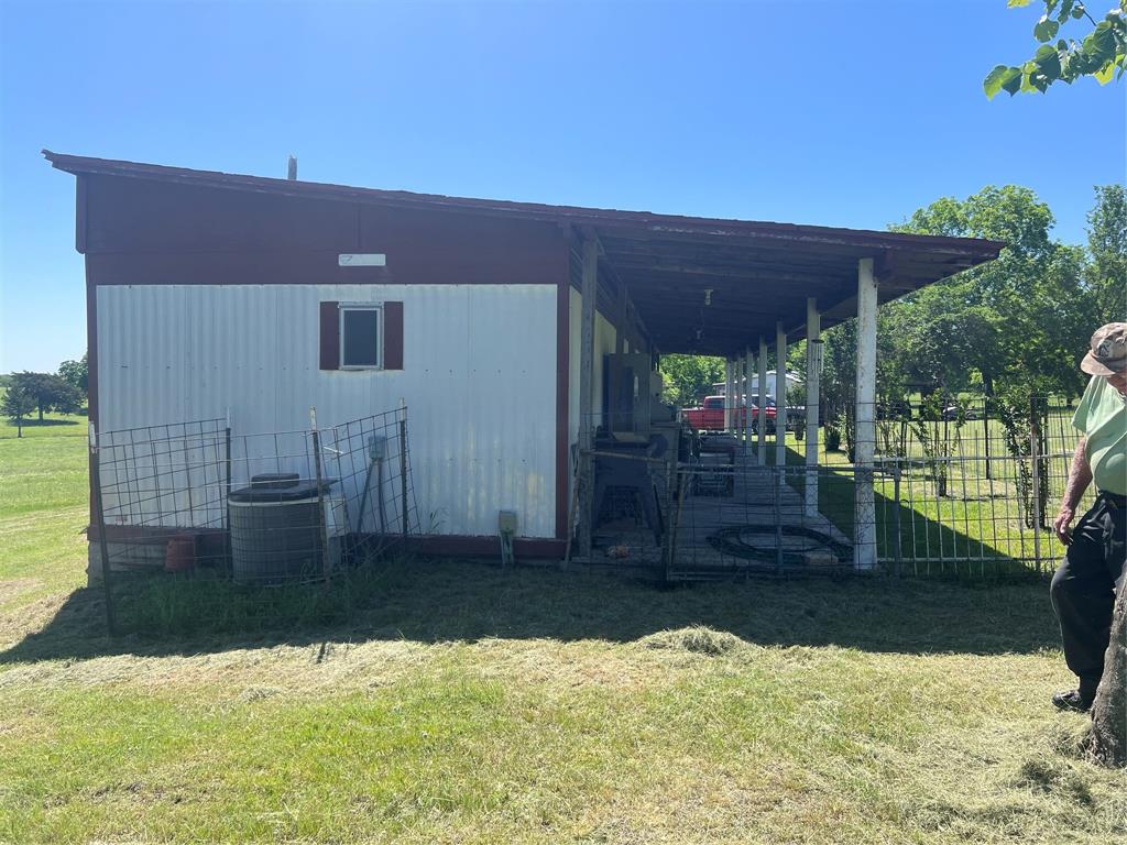 0 Holland Road Forestburg, TX 76239 - Photo 13 of 39 a view of a house with backyard porch and sitting area