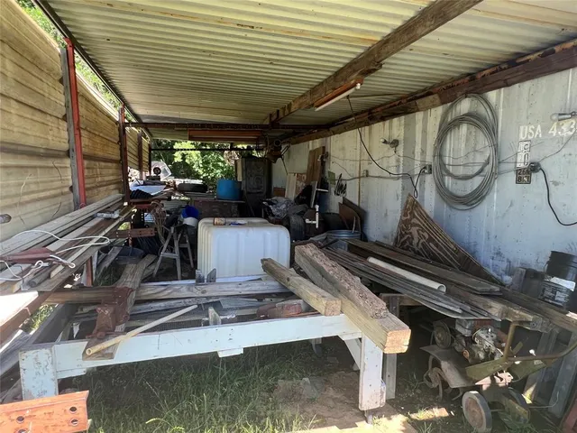 a bedroom with bed and window