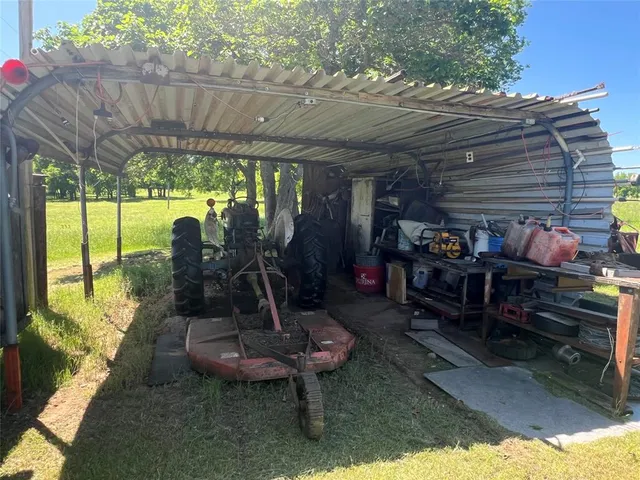 a view of a room with racks on the wall
