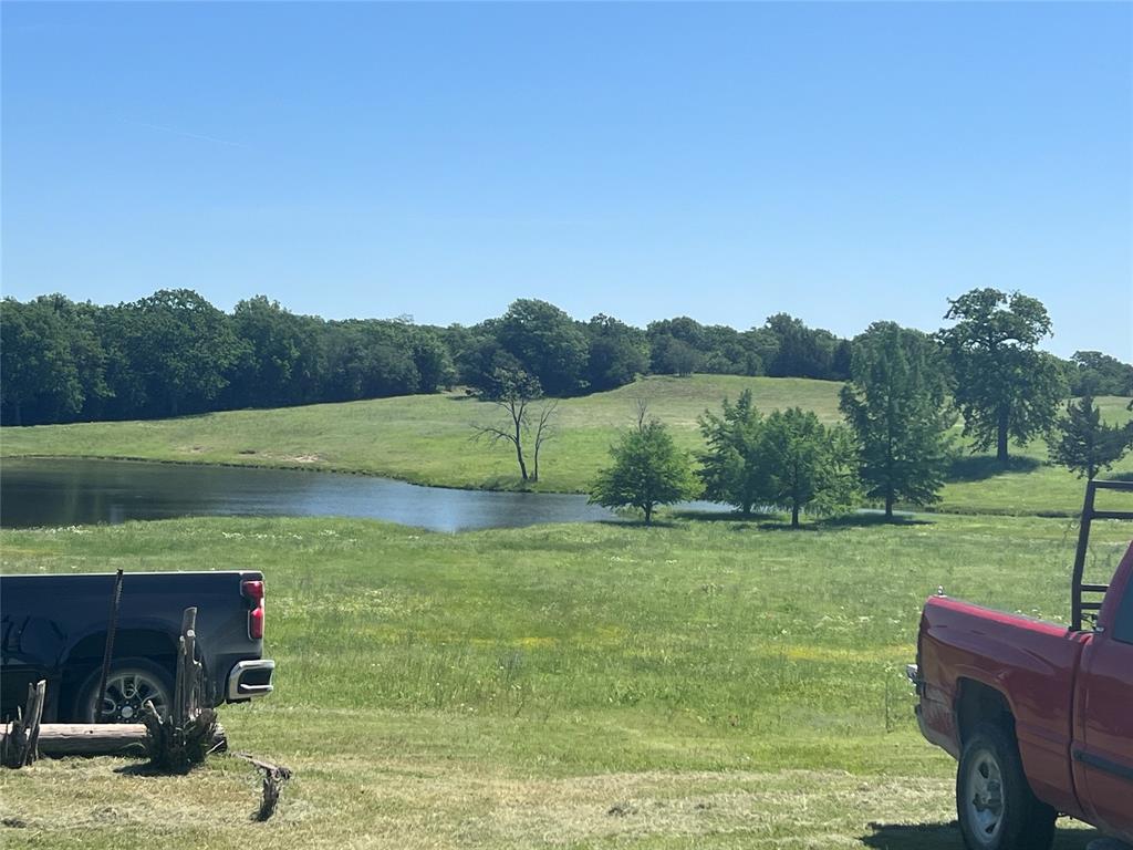 0 Holland Road Forestburg, TX 76239 - Photo 8 of 39 a view of a lake with a yard