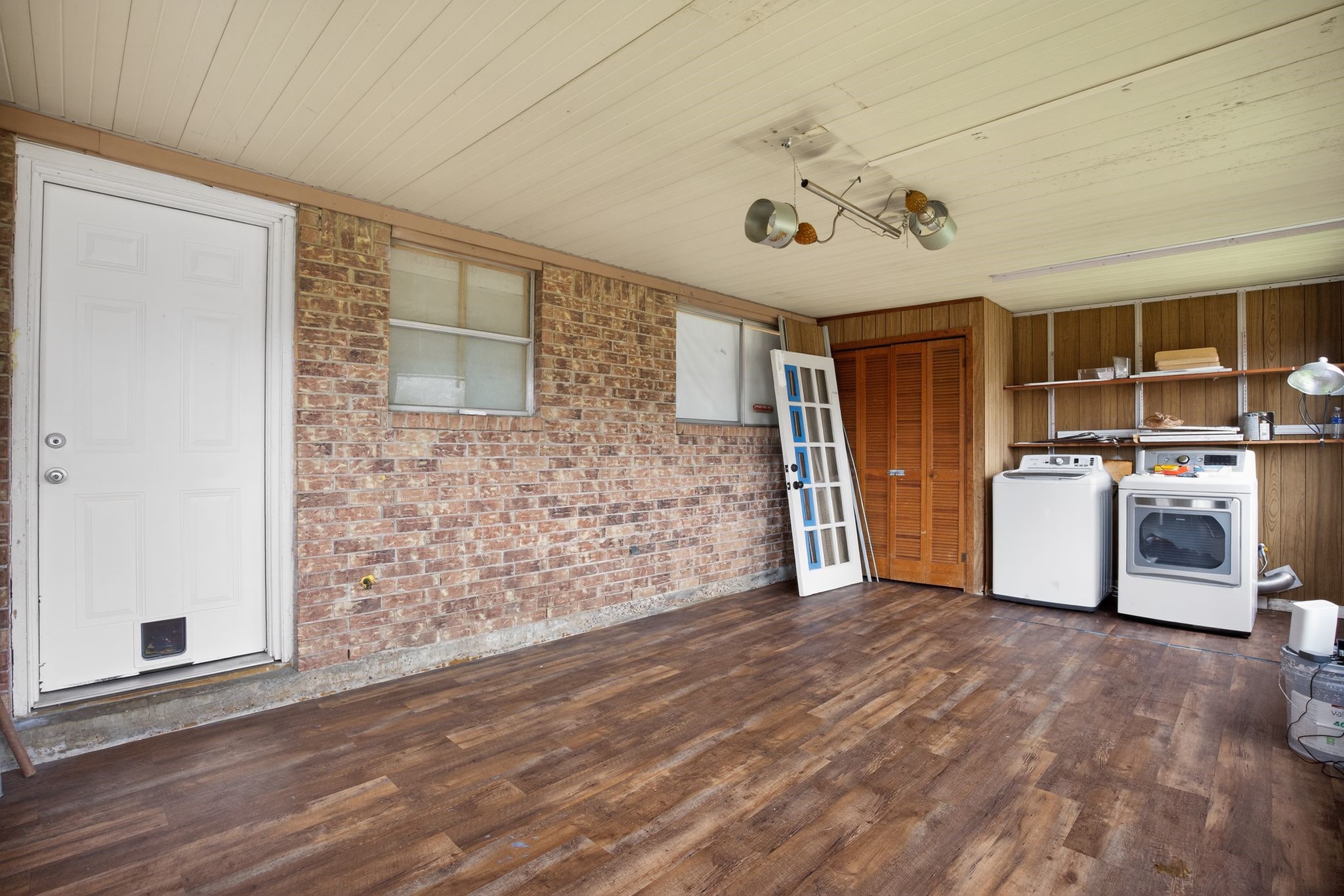 910 McLeary Street Houston, TX 77020 - Photo 16 of 23 a view of a refrigerator in kitchen and wooden floor