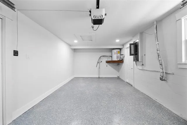 a view of a kitchen with a sink and cabinet area