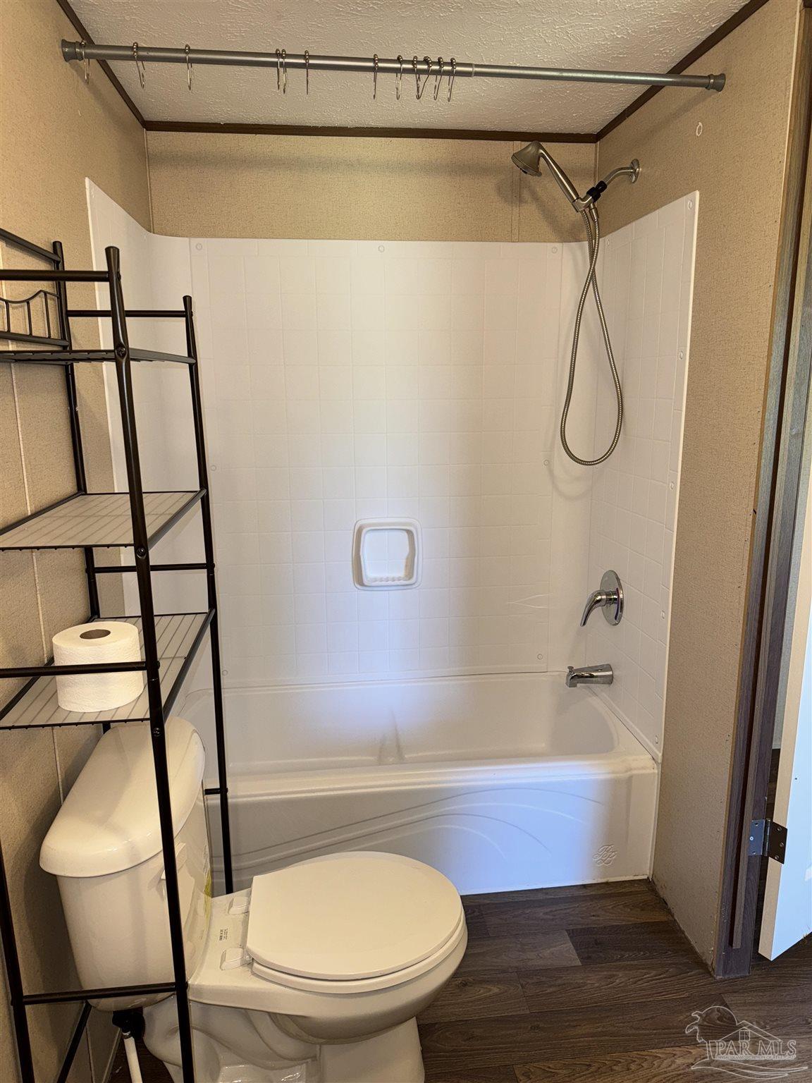 5049 Bent Tree Road Milton, FL 32583 - Photo 29 of 34 a bathroom with a sink and a mirror
