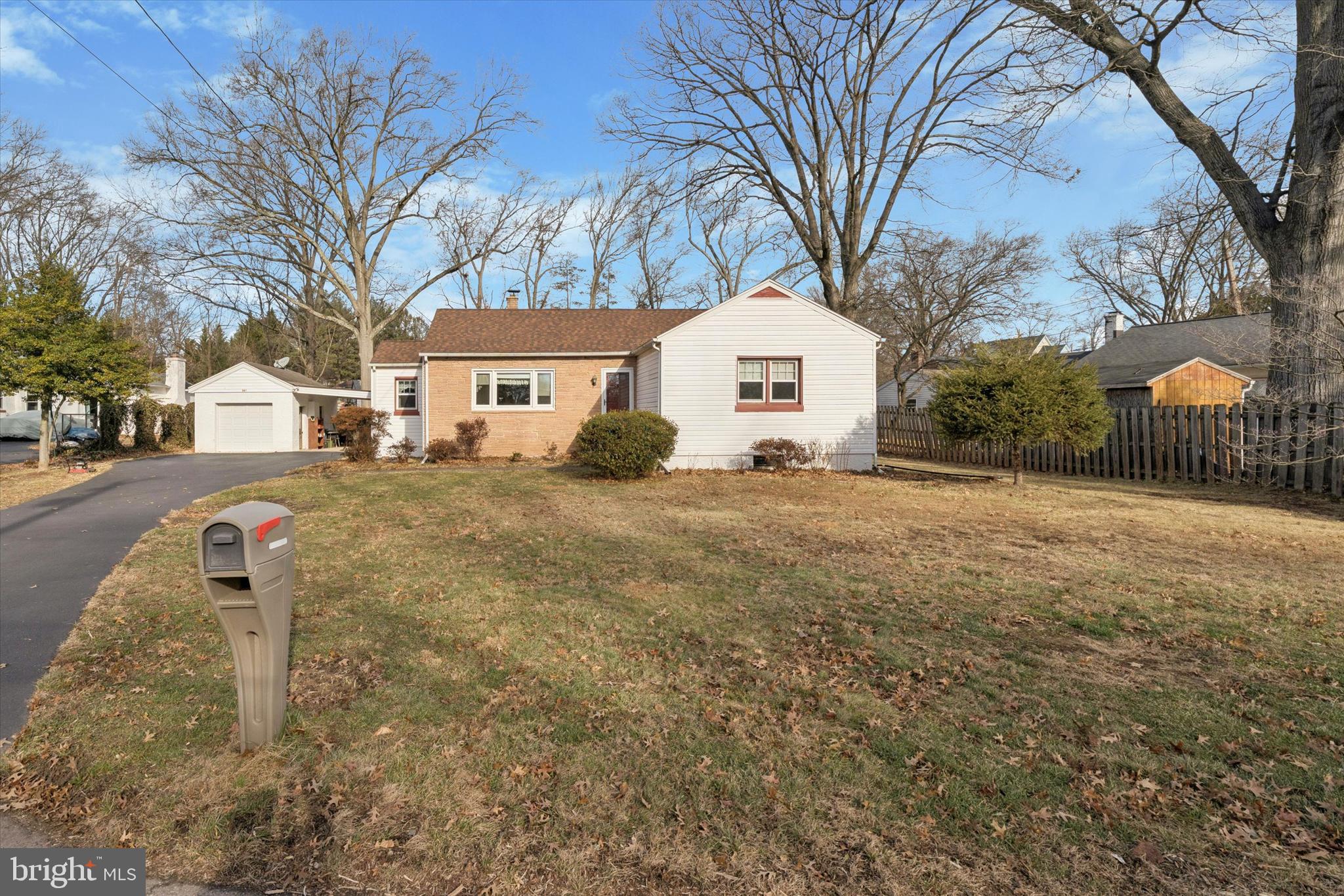 507 Park Road Spring City, PA 19475 - Photo 12 of 15 a front view of a house with a yard and garage
