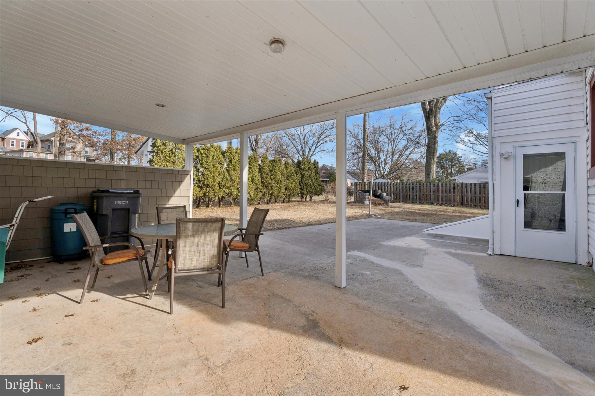 507 Park Road Spring City, PA 19475 - Photo 13 of 15 a view of a patio with table and chairs and potted plants