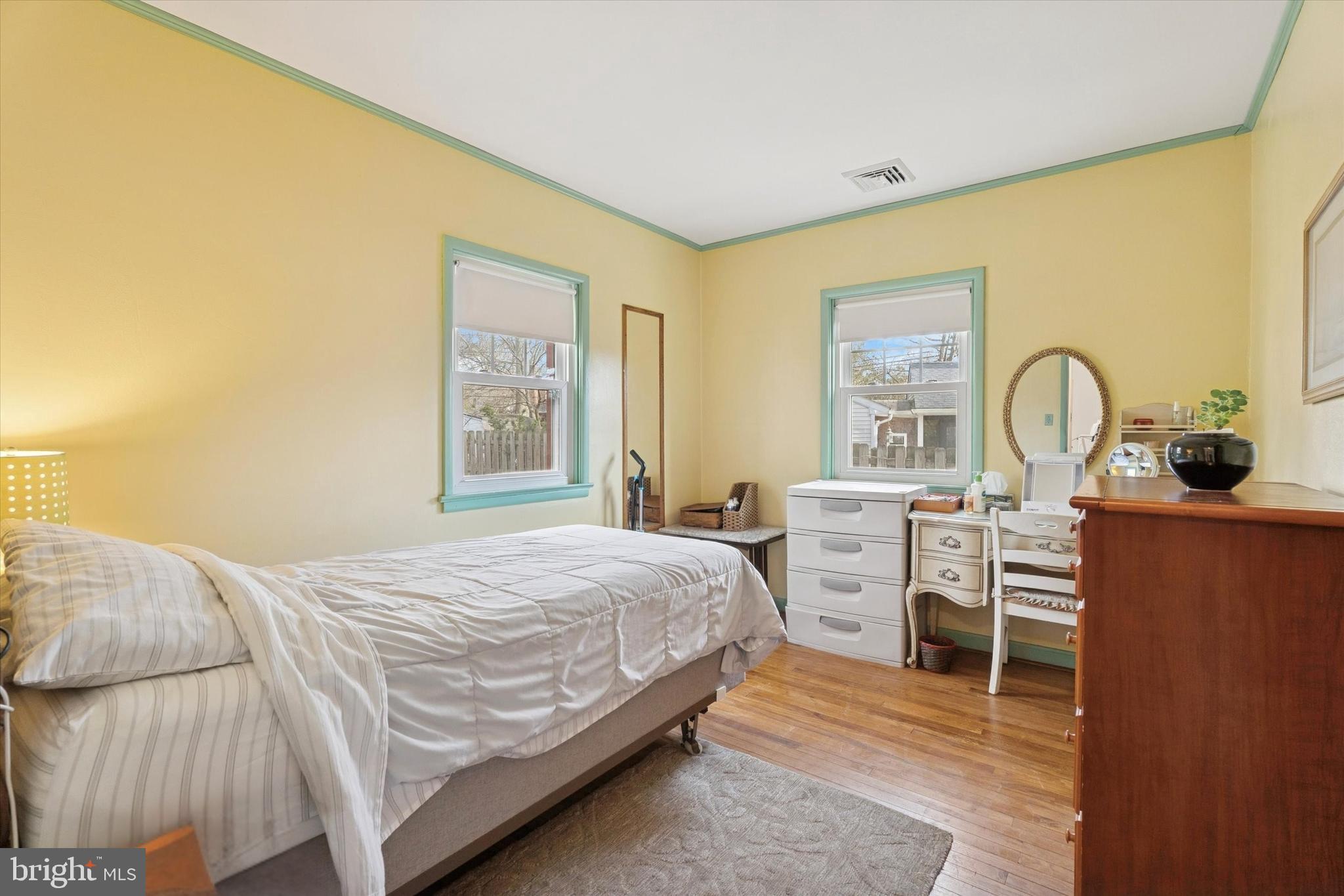 507 Park Road Spring City, PA 19475 - Photo 9 of 15 a bedroom with a bed and a dresser with mirror