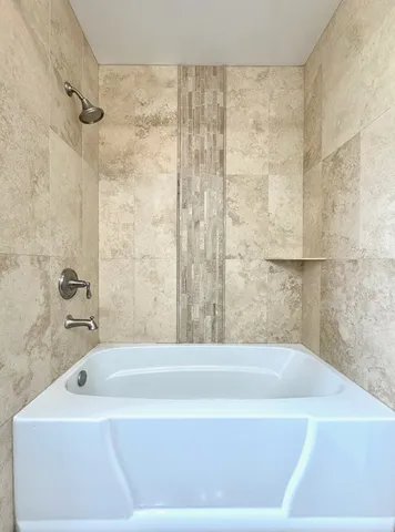 a bathroom with a bathtub