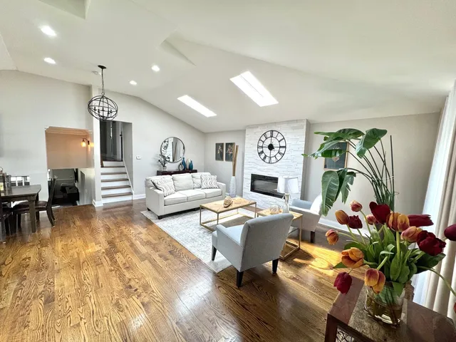a living room with furniture and a table